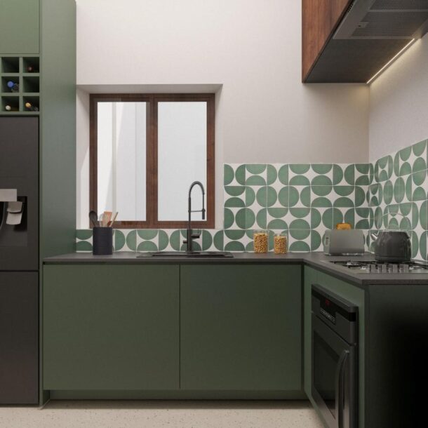 Contemporary kitchen with green cabinetry and patterned tiles in Avinyó 17 Barcelona