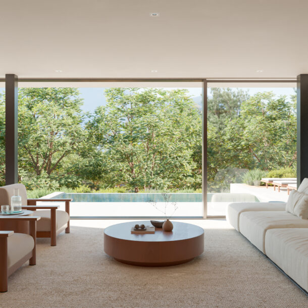 Outdoor terrace with an infinity pool overlooking the greenery in a luxury villa in Begur.