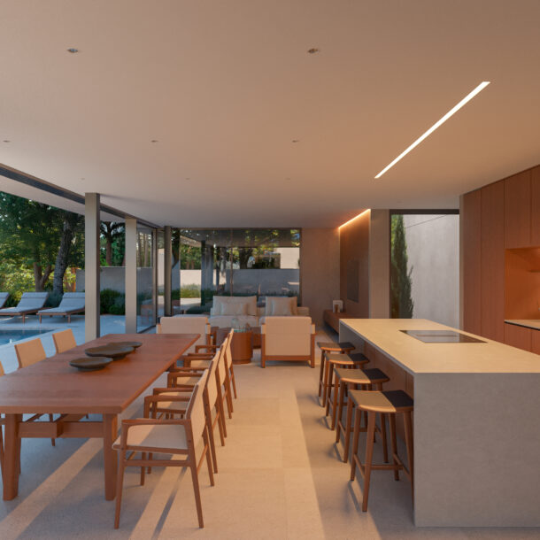 Spacious open-concept living area with a modern kitchen in a luxury villa in Begur.